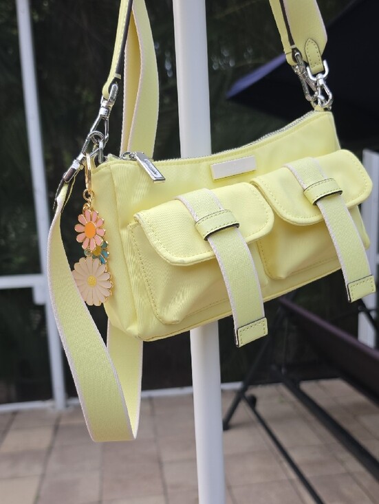 kate spade Handbags - Kate Spade 'Carter Nylon Cargo' Yellow Shoulder Bag with Daisy Charm